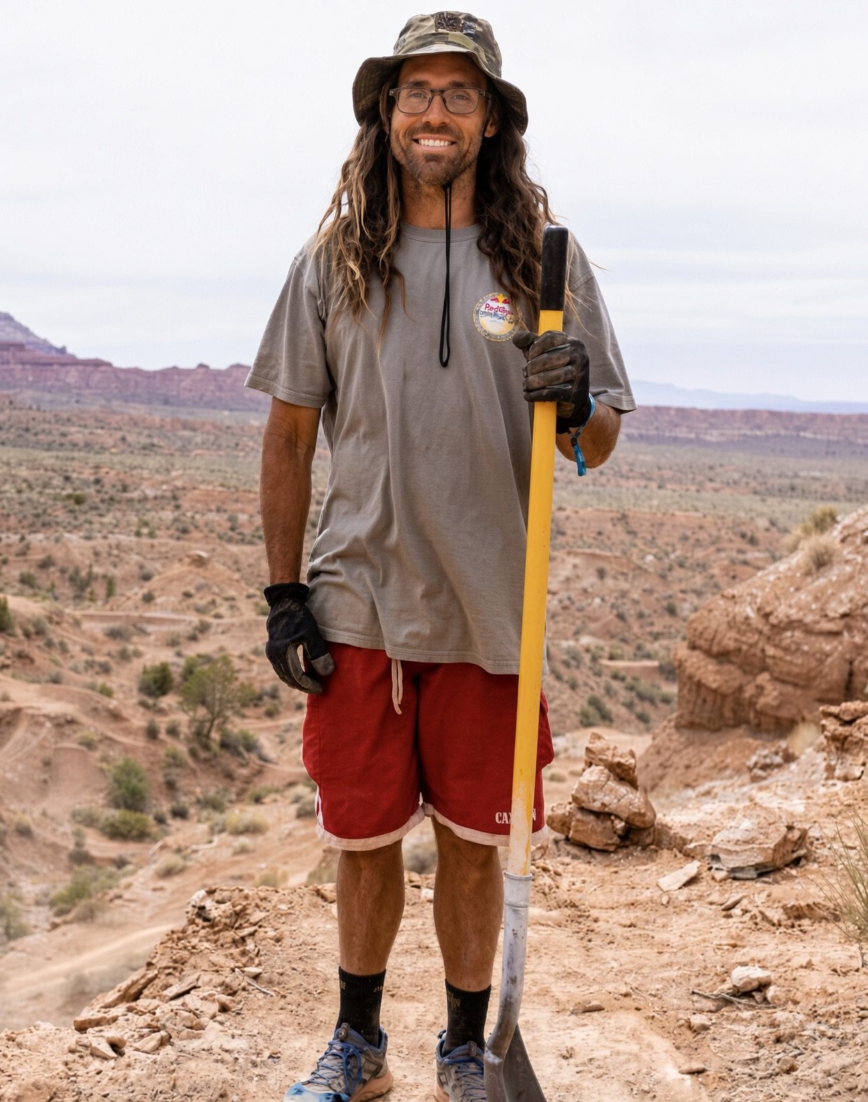 Ryan Rodriguez with a shovel overlooking the Red Bull Formation venue, 2020